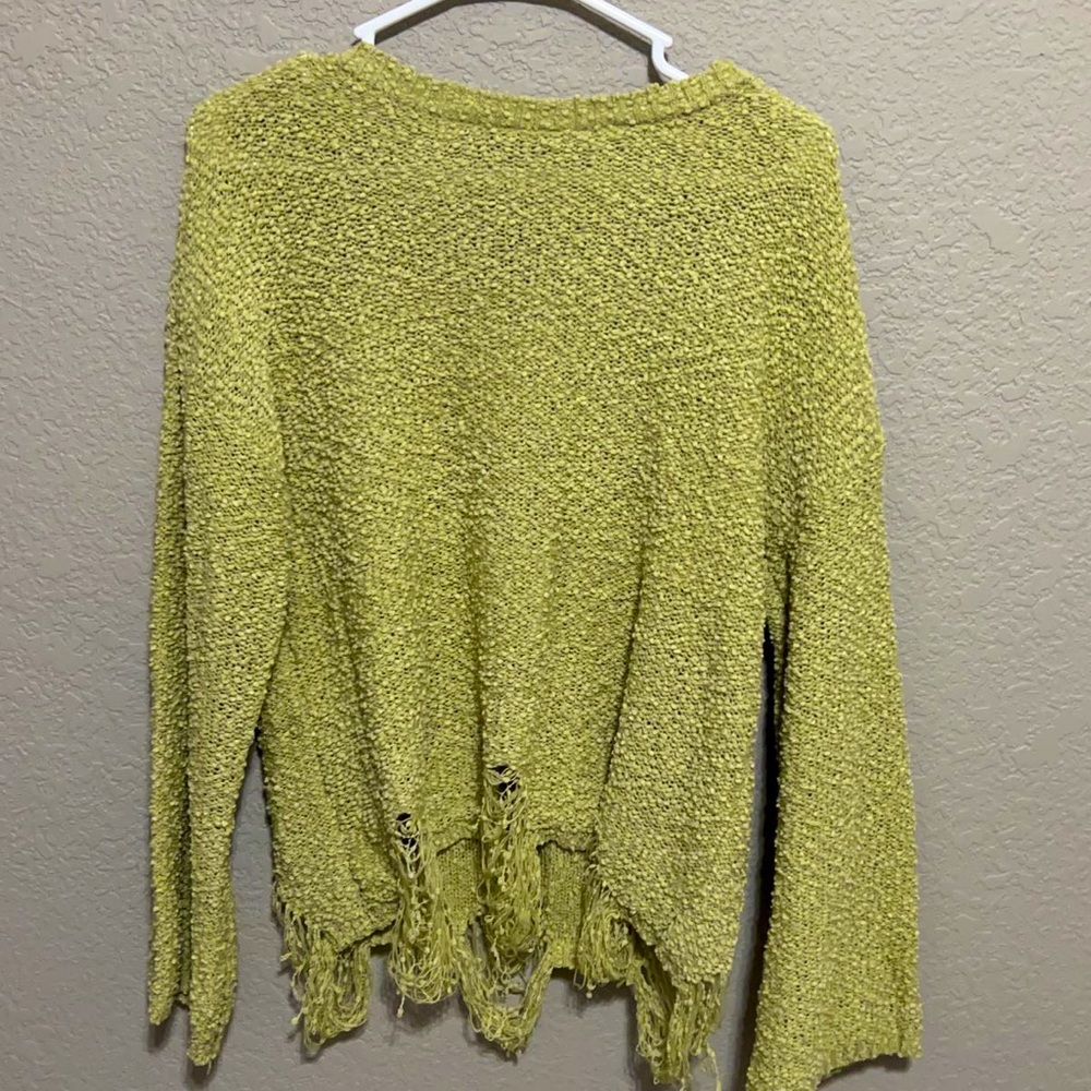 green sweater